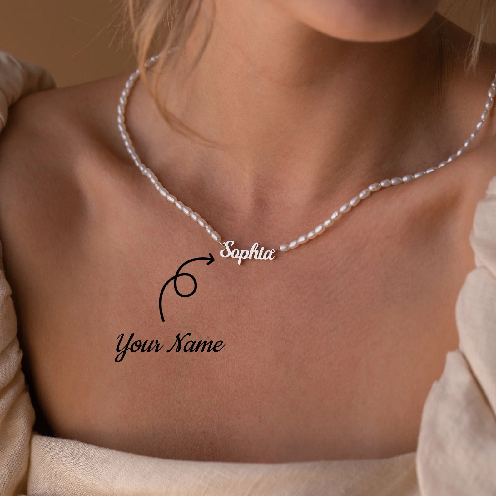 Custom name necklace on a pearl chain, personalized with the name Sophia
