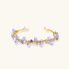 Fluorite and freshwater pearl gold-tone cuff bracelet on white background