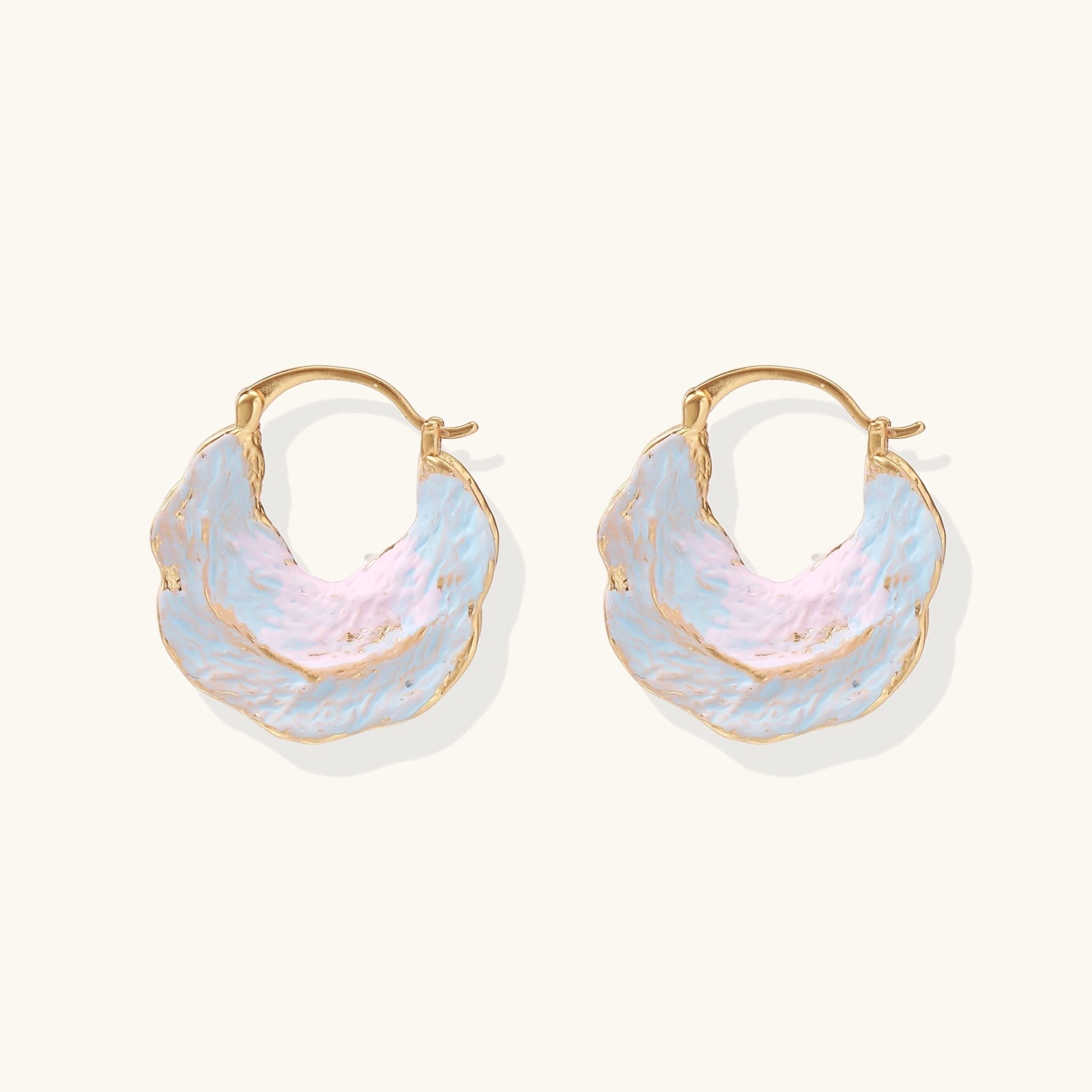 Tide pool enamel hoops on cream background