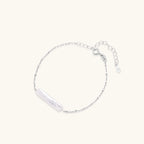 Baroque pearl chain bracelet in silver-tone on cream background