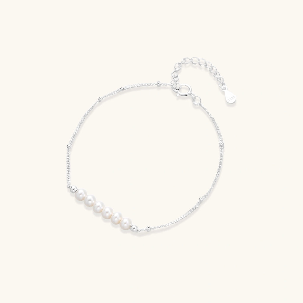 Pearl whisper bracelet in silver-tone on white background