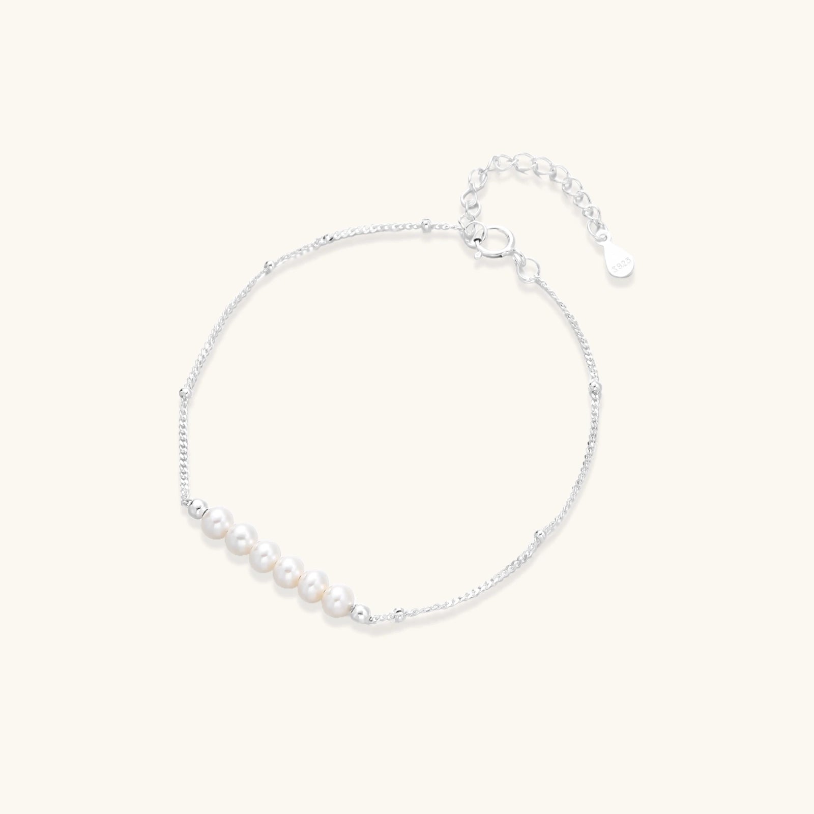 Pearl whisper bracelet in silver-tone on white background