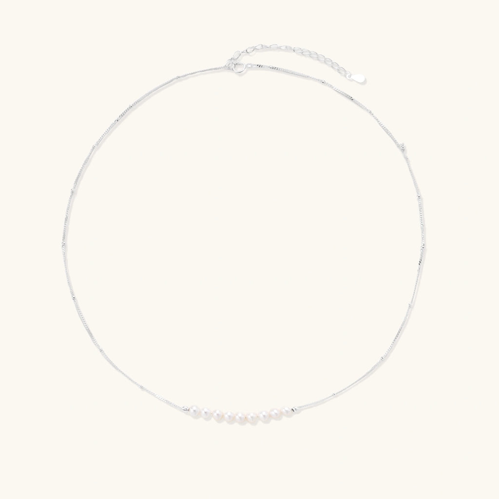 Pearl smile arc necklace detail