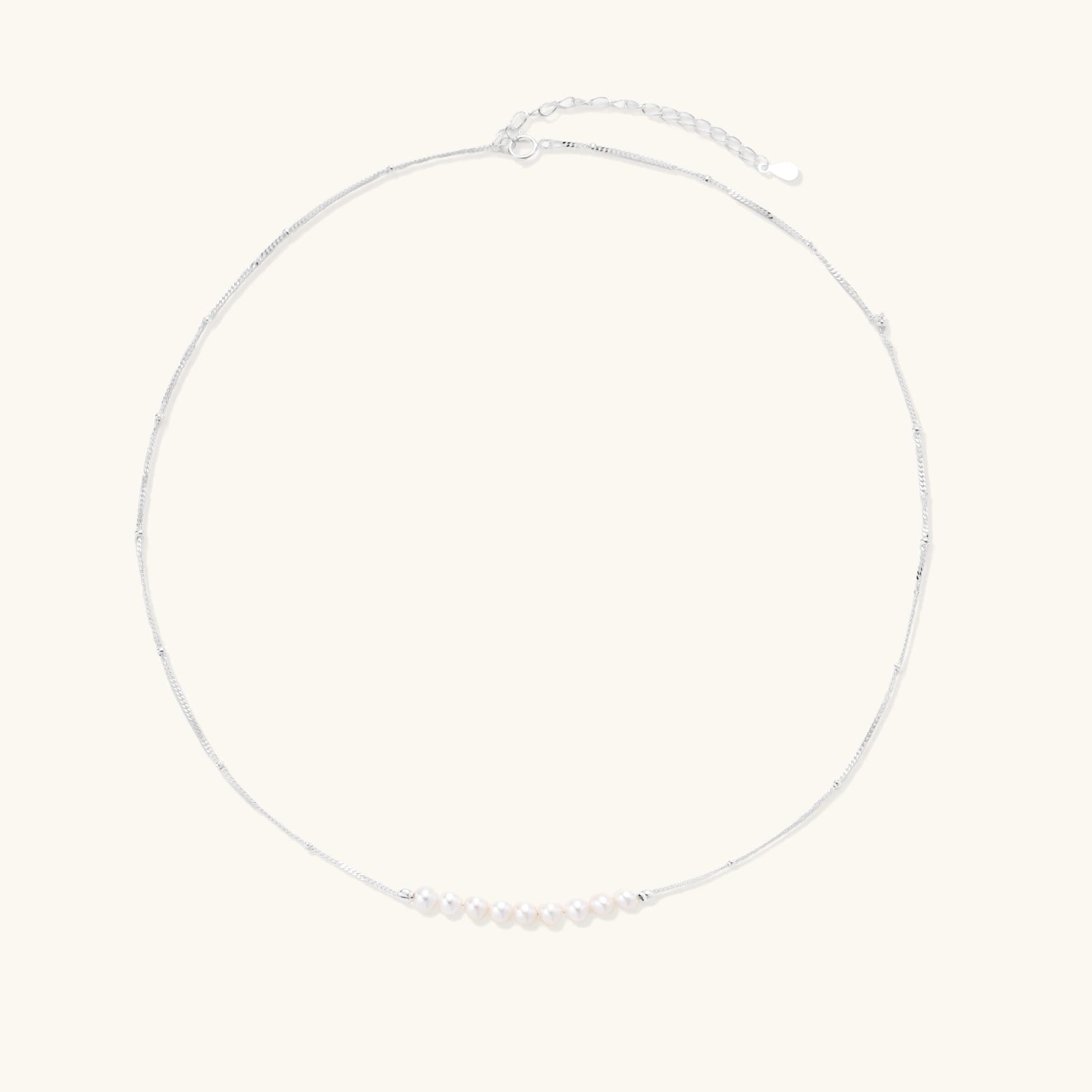 Pearl smile arc necklace detail