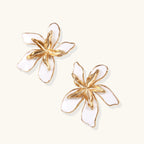 Gold-tone enamel flower earrings side view
