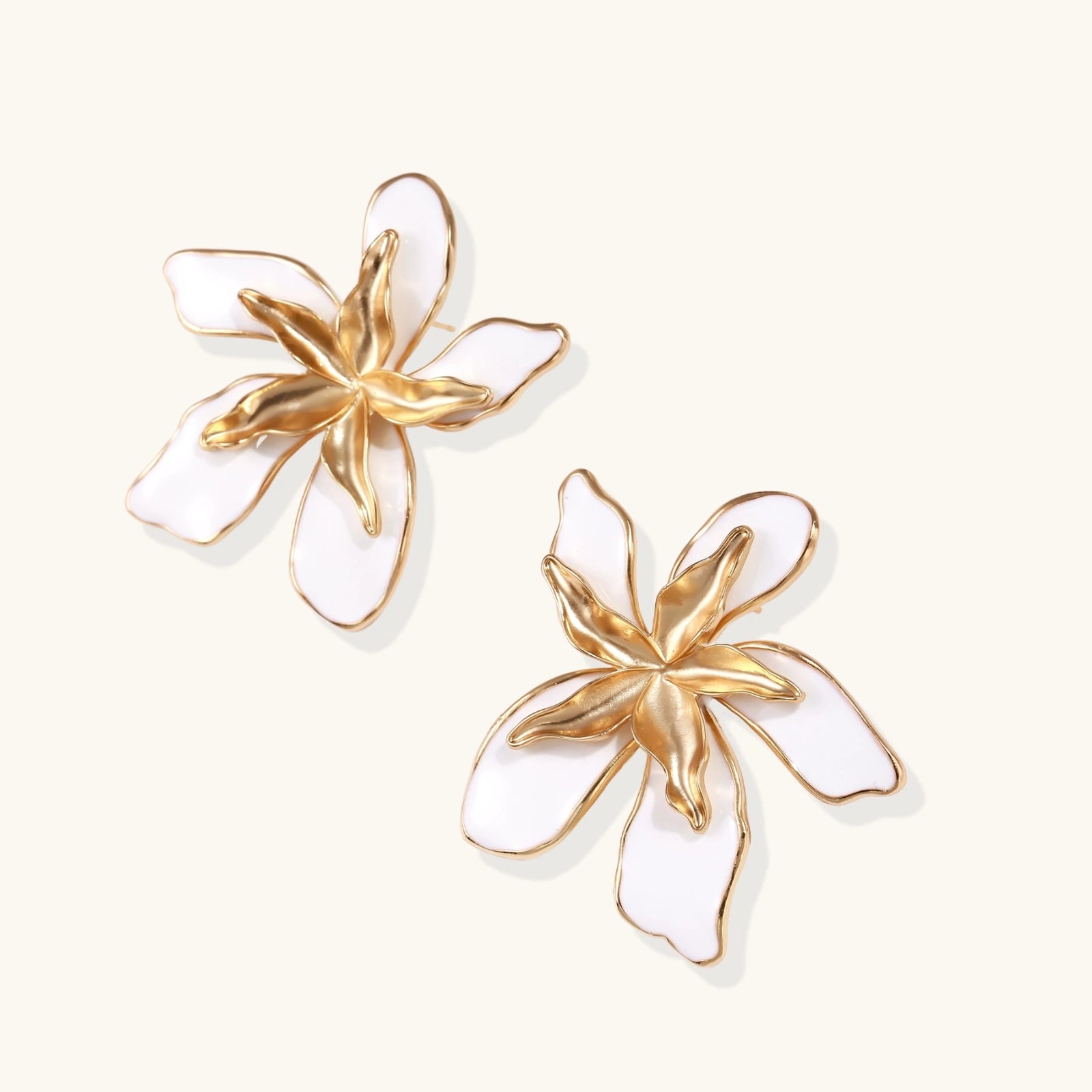 Gold-tone enamel flower earrings side view