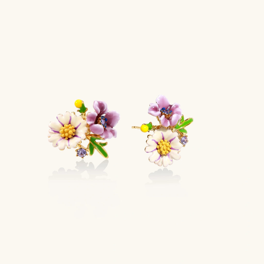 Gold-tone enamel wildflower stud earrings on white background