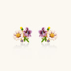 Enamel daisy and pansy studs close-up