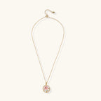 Enamel rose flower pendant close-up detail