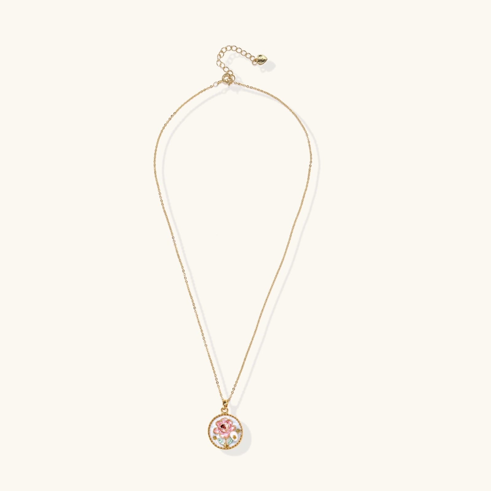 Enamel rose flower pendant close-up detail