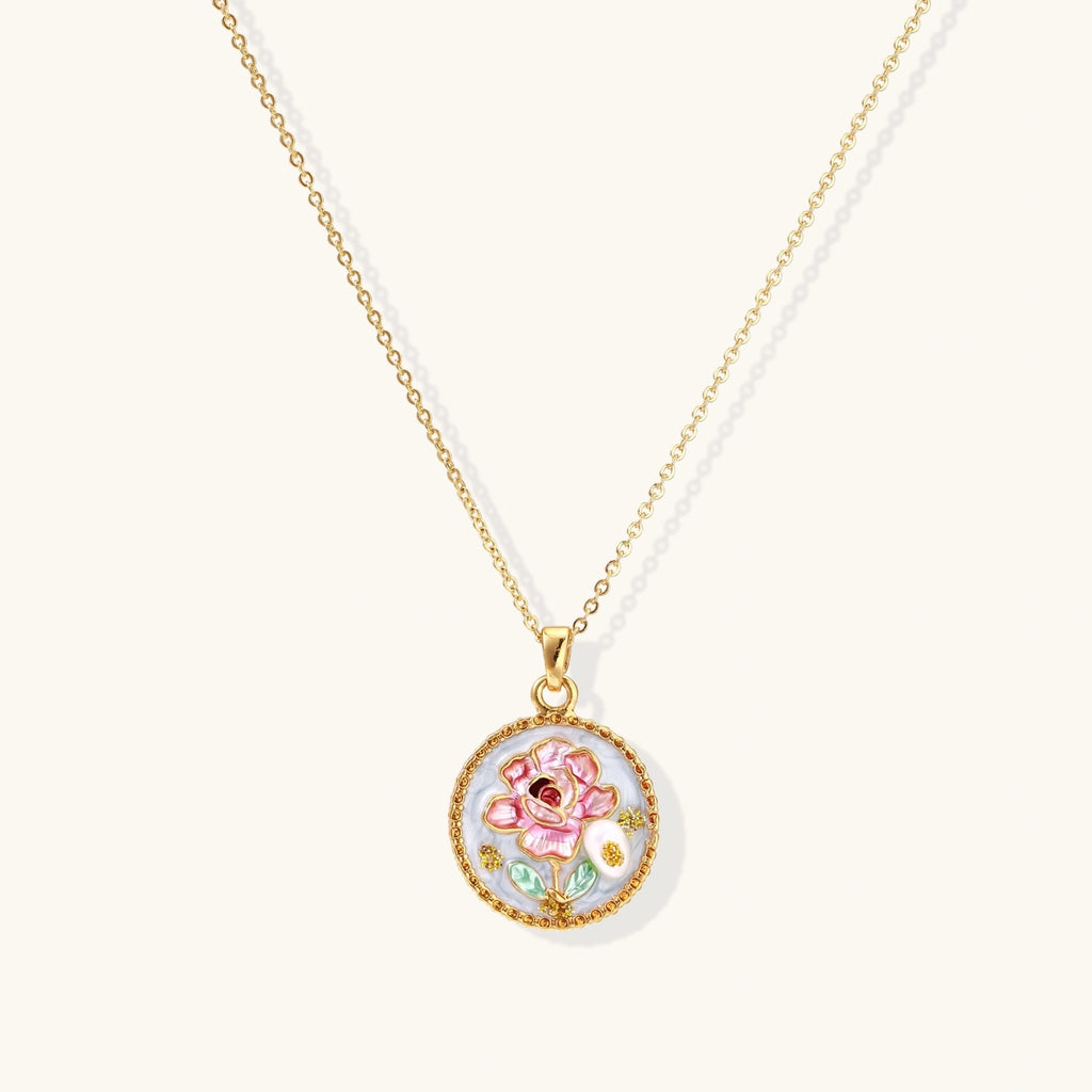 Gold-tone enamel rose pendant necklace with pearl centre