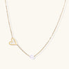 Heart and pearl pendant necklace in gold-tone