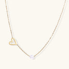 Heart and pearl pendant necklace in gold-tone