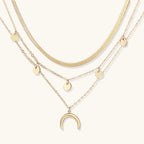 Four-layer gold-tone necklace set with crescent moon charm