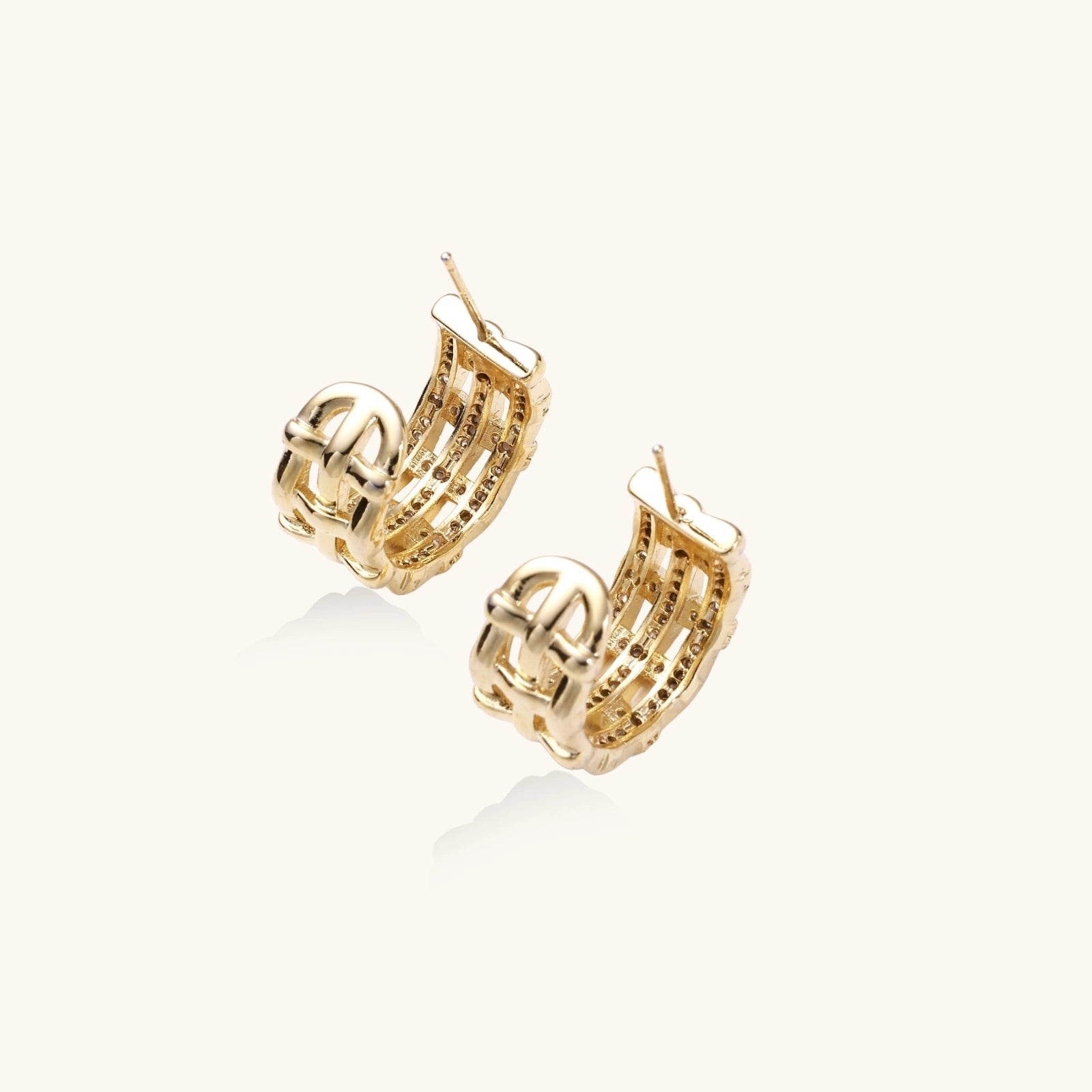 Gold-tone basket-weave hoop earrings close-up