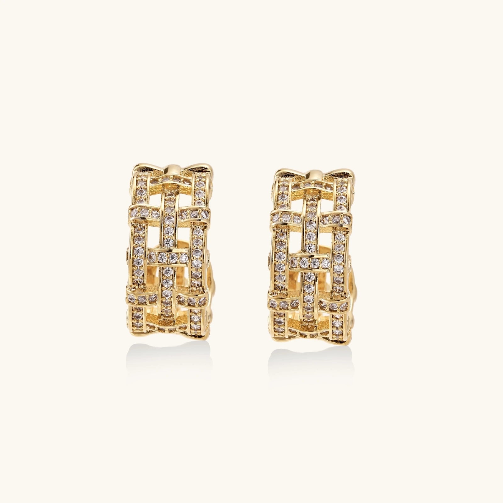 Openwork gold hoops shown as a pair