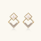 Gold-tone double-frame pearl earrings close-up