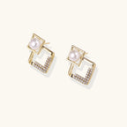 Geometric pearl and crystal earrings detail