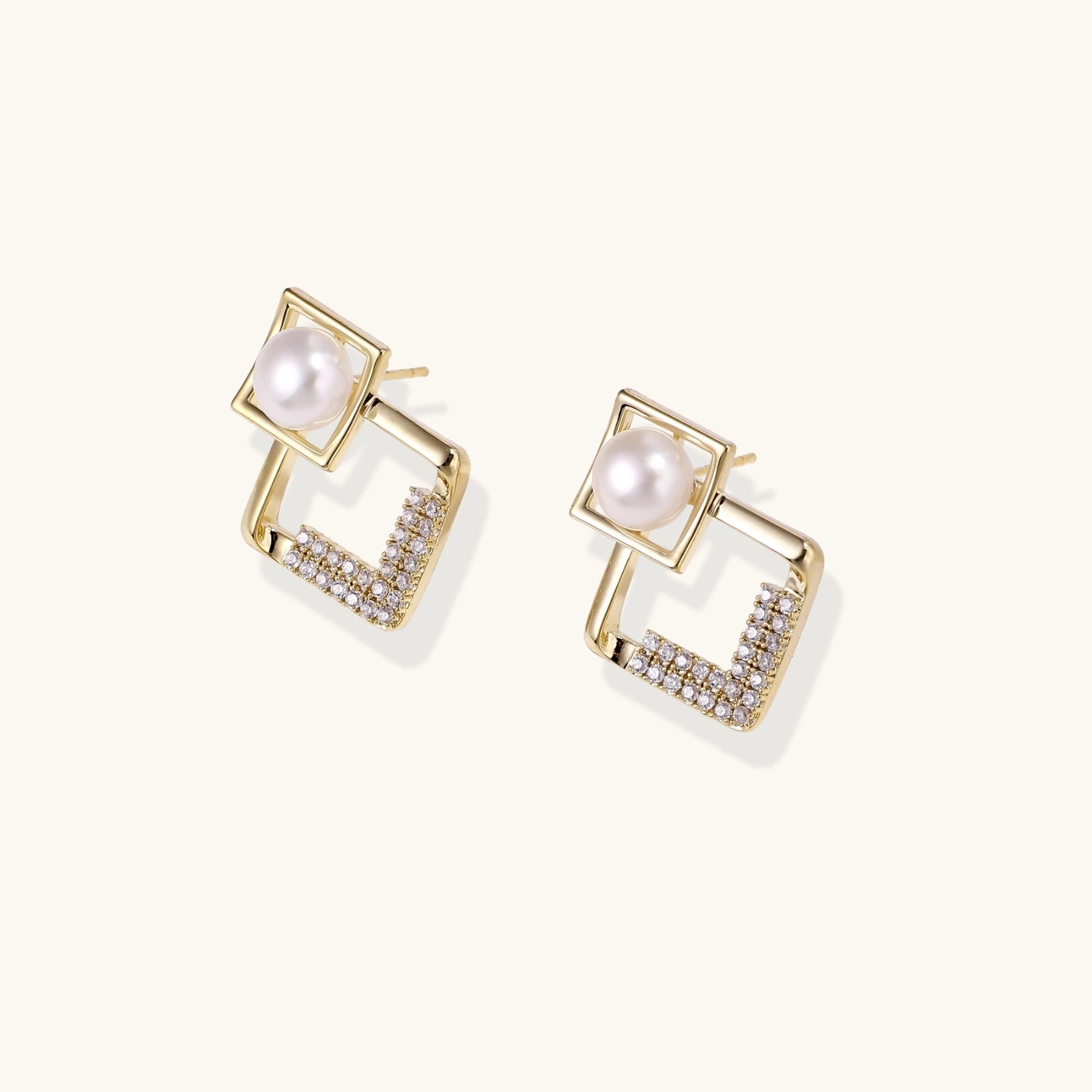 Geometric pearl and crystal earrings detail
