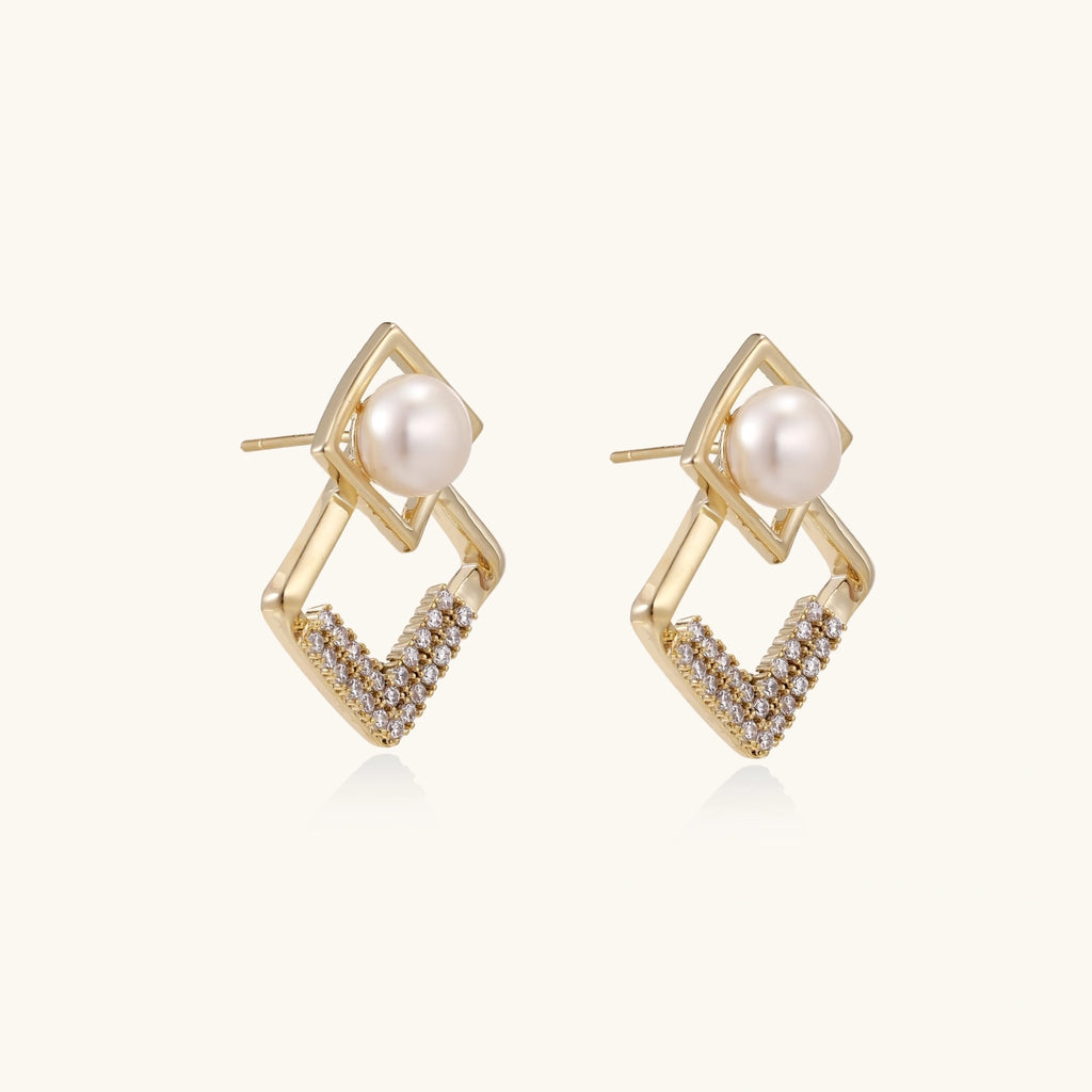 Pearl geometry earrings shown as a pair