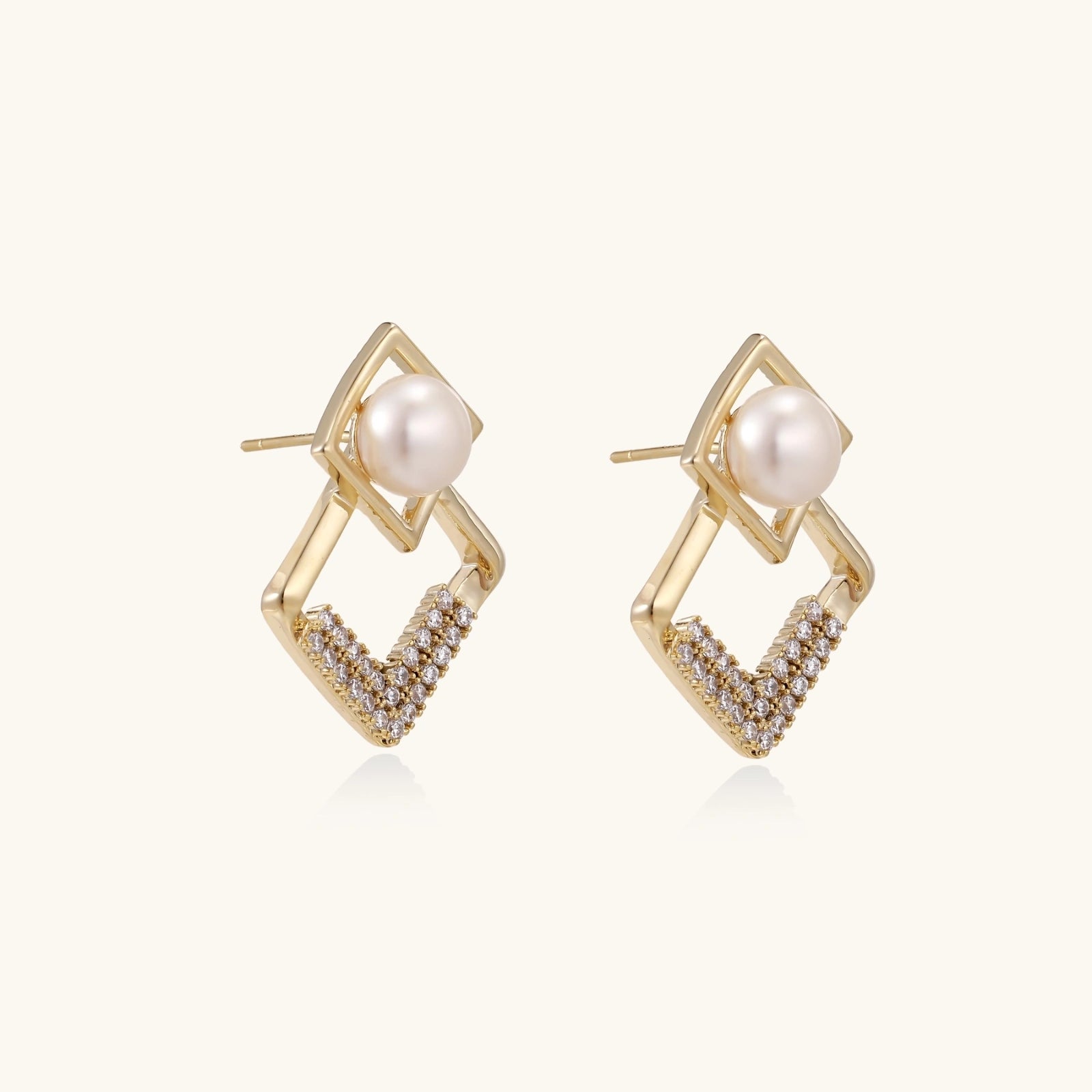 Pearl geometry earrings shown as a pair