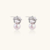Stardust pearl drop earrings in silver-tone on white background