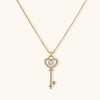 Secret heart key necklace in gold-tone on cream background