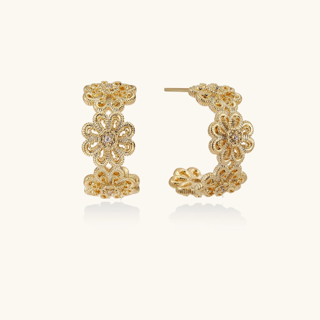 Bloom filigree gold hoops on cream background