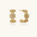 Bloom filigree gold hoops on cream background