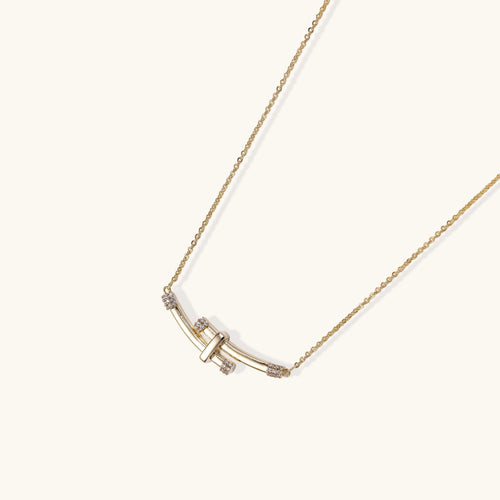 Pave crystal curved bar pendant close-up