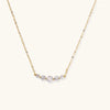 Golden arc zirconia necklace in gold-tone on fine chain