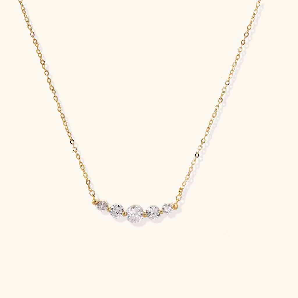 Golden arc zirconia necklace in gold-tone on fine chain