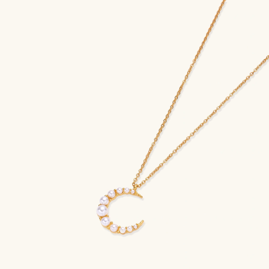 Shell pearl crescent moon pendant close-up