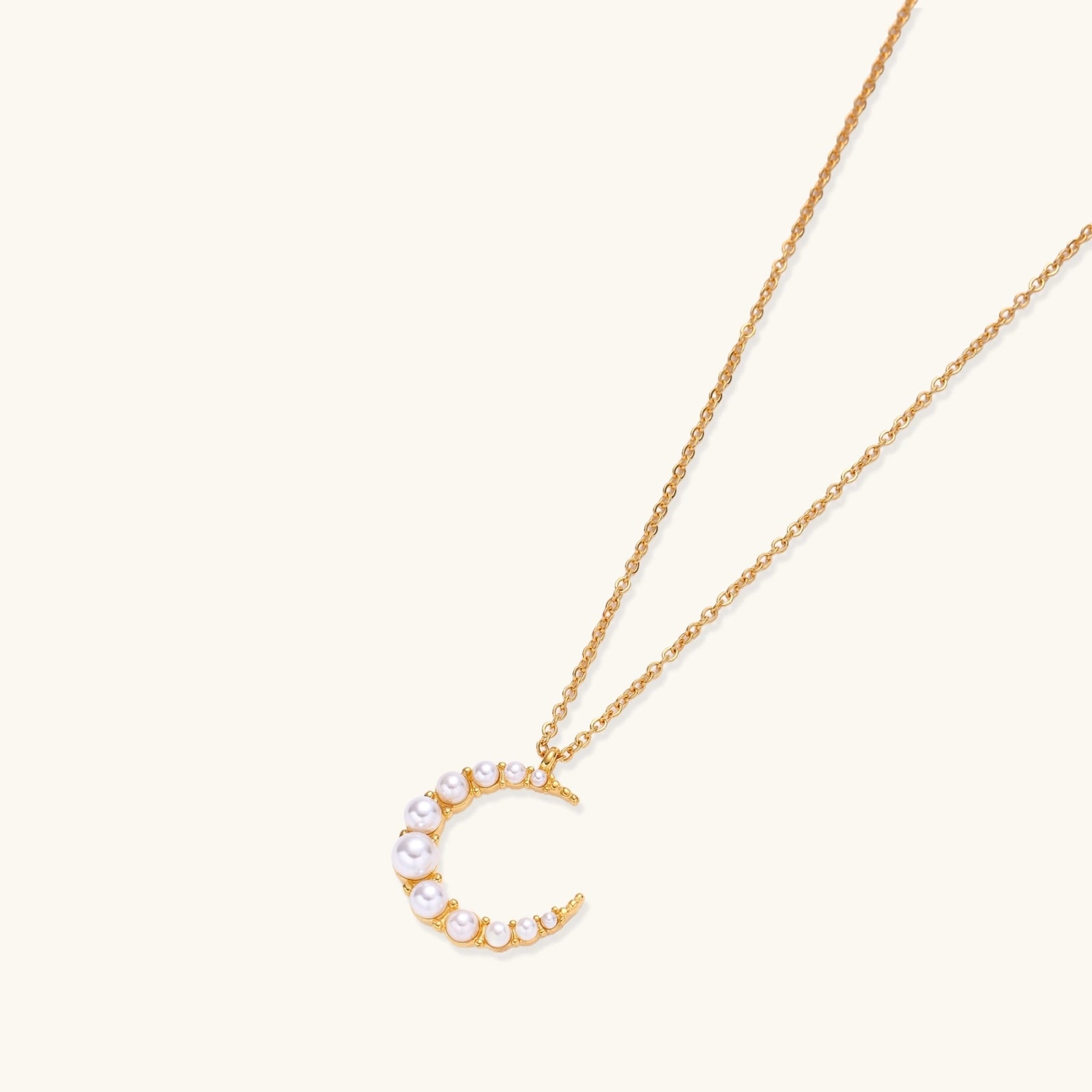 Shell pearl crescent moon pendant close-up