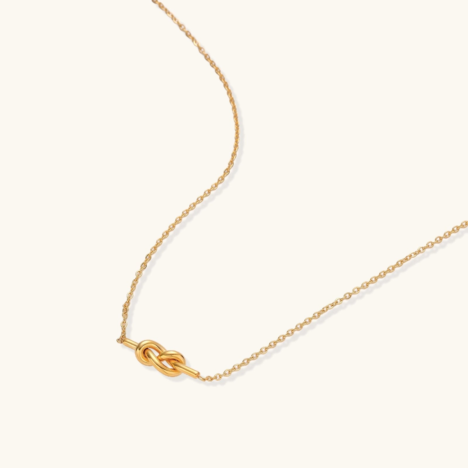 Infinity knot pendant necklace close-up