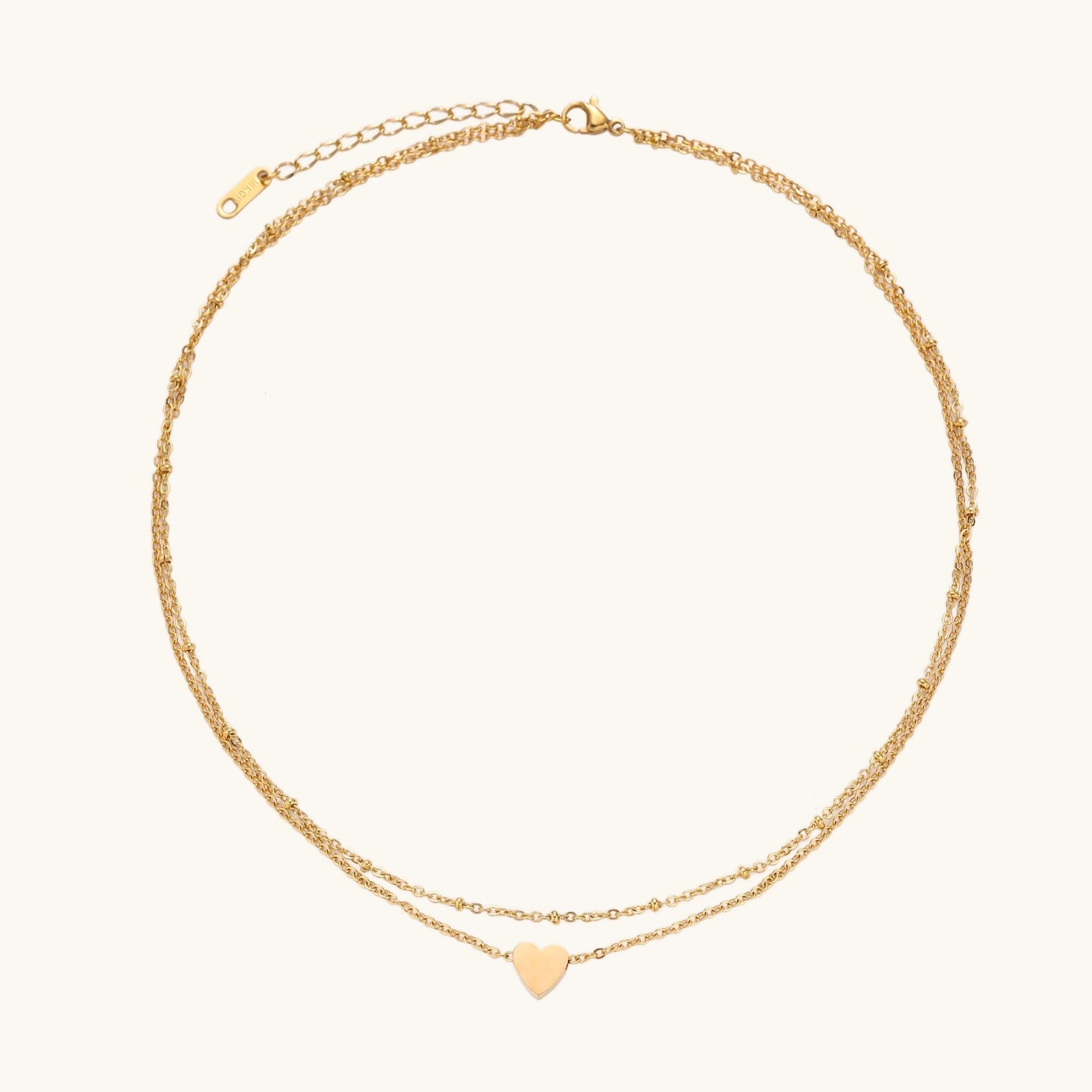 Gold-tone layered heart necklace close-up of heart pendant