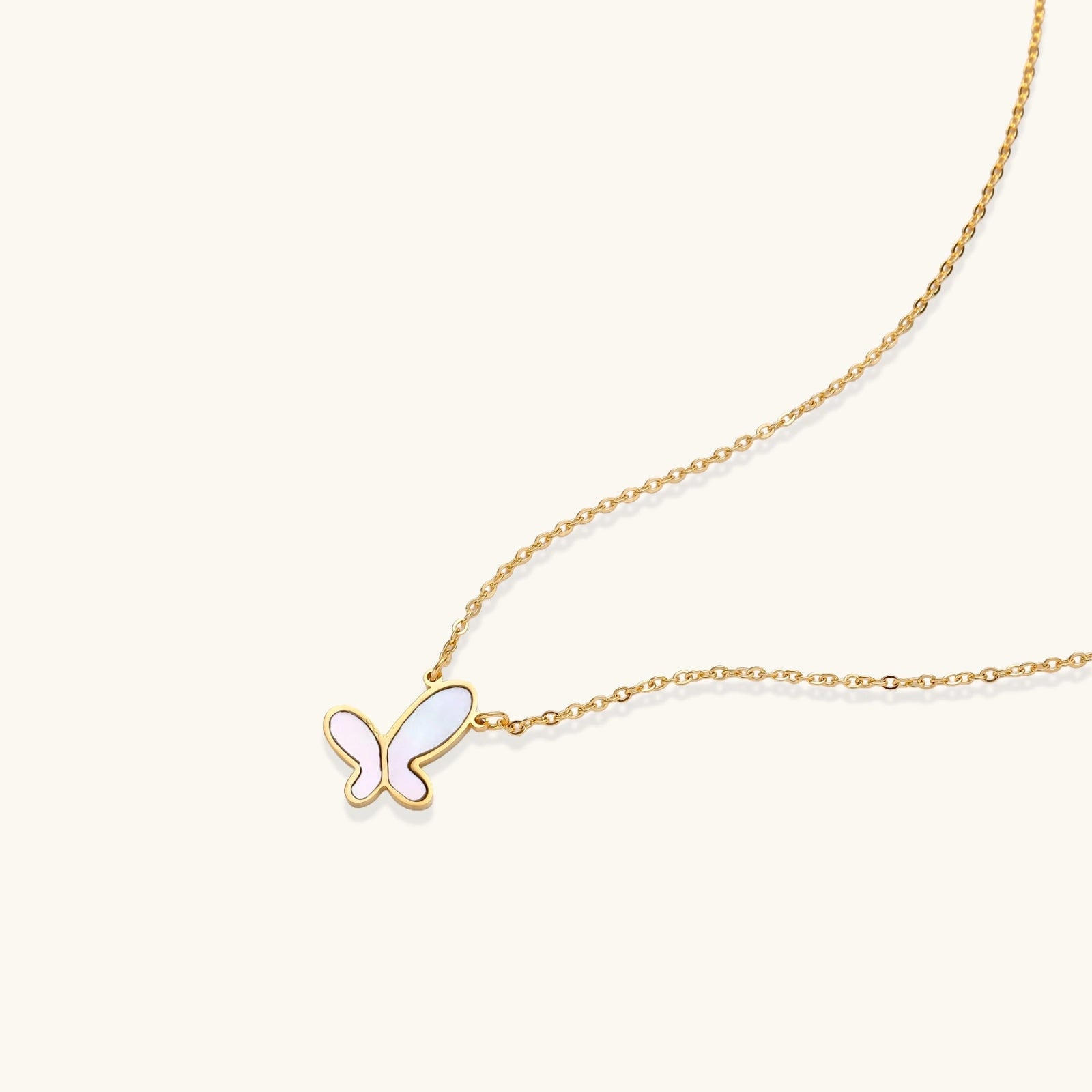 Iridescent mother-of-pearl butterfly pendant close-up