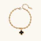 Mother-of-pearl clover gold-tone bracelet close-up