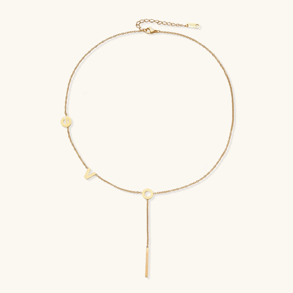 Lariat necklace letter charms detail