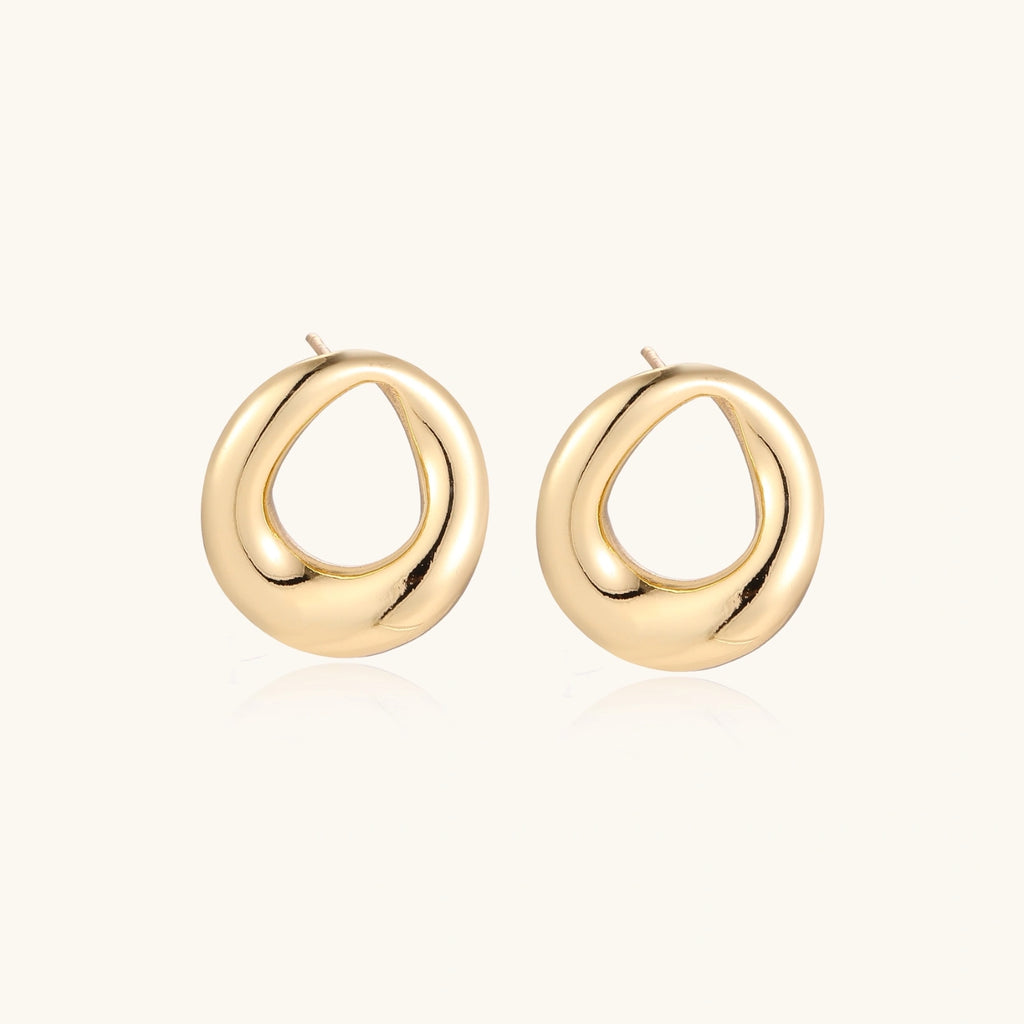 Open teardrop gold-tone studs close-up
