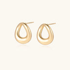 Gold-tone teardrop studs shown as a pair