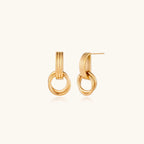 Gold-tone interlocking ring drop earrings on white background