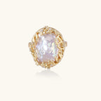Gold-tone filigree pearl ring close-up
