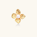 Gold-tone petal ring with cotton pearl close-up