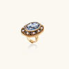 Gold-tone cameo ring with carved floral motif and shell pearls
