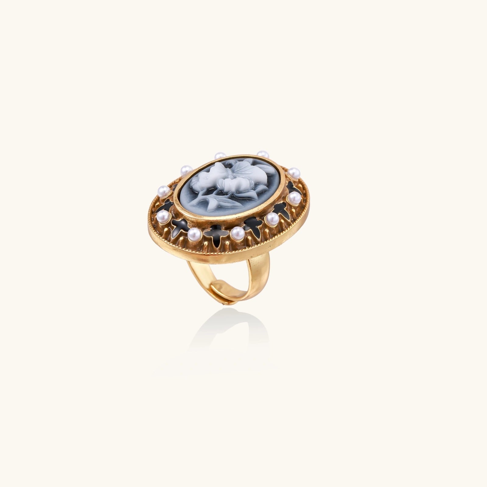 Gold-tone cameo ring with carved floral motif and shell pearls