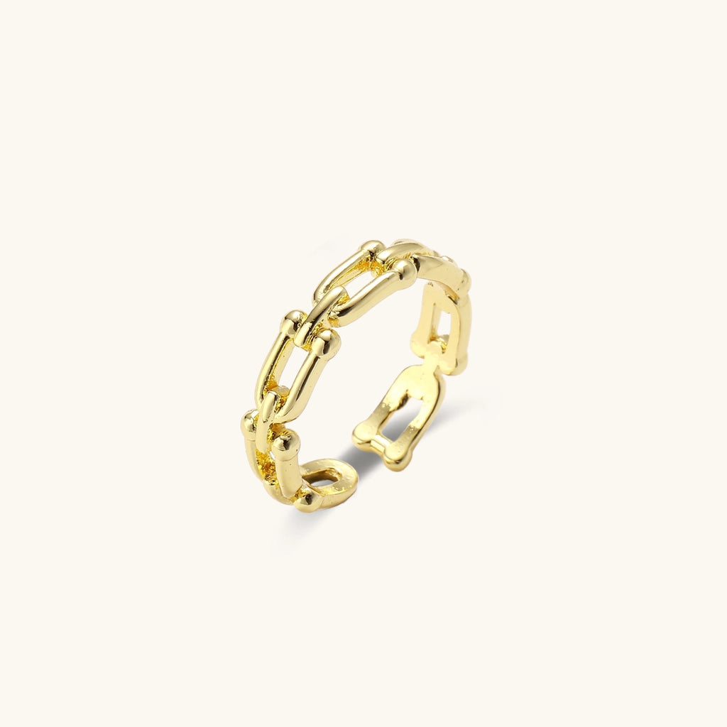 Stackable gold-tone ring set close-up detail