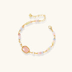 Rose quartz and pearl beaded bracelet in gold-tone