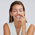 Luna pearl arc necklace shown on white background