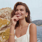 Gold-tone knot cuff detail